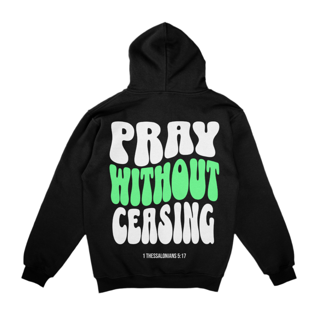 A black hoodie with "PRAY WITHOUT CEASING" in large white and green letters, and "1 Thessalonians 5:17" below, displayed on a white background 
